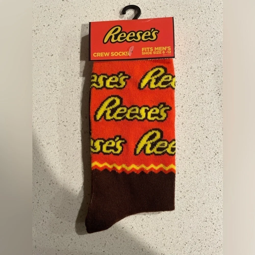 Reese’s novelty Men's Crew Socks - Orange and Brown size 6-12